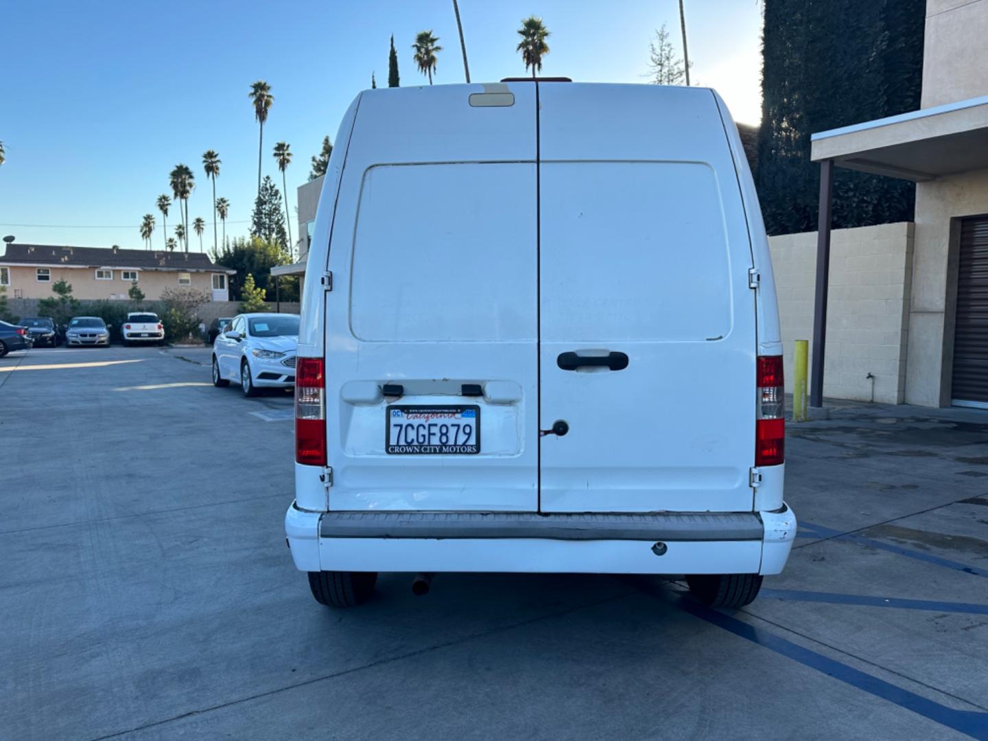 2012 White /Black Ford Transit Connect XLT with Rear Door Glass (NM0LS7BN0CT) with an 2.0L L4 DOHC 16V engine, 4-Speed Automatic transmission, located at 30 S. Berkeley Avenue, Pasadena, CA, 91107, (626) 248-7567, 34.145447, -118.109398 - Great price point for a work van. - Photo#3